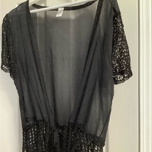 Women’s sheer shrug. Black. Mi it brand size L/XL. Crochet sleeves and trim